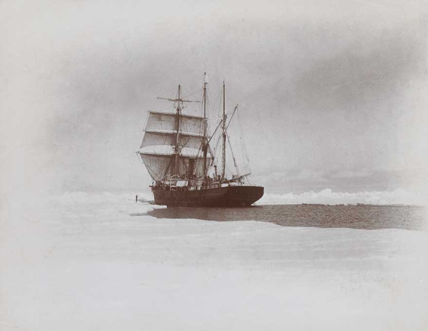 The Nimrod, under sail and steam, forcing her way through the pack ice towards Cape Royds and Ross Island.